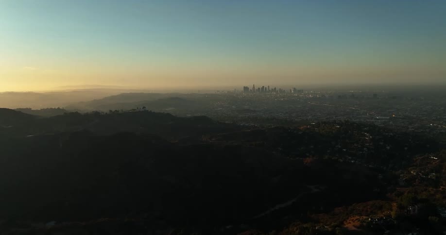 A city skyline seen from the hills