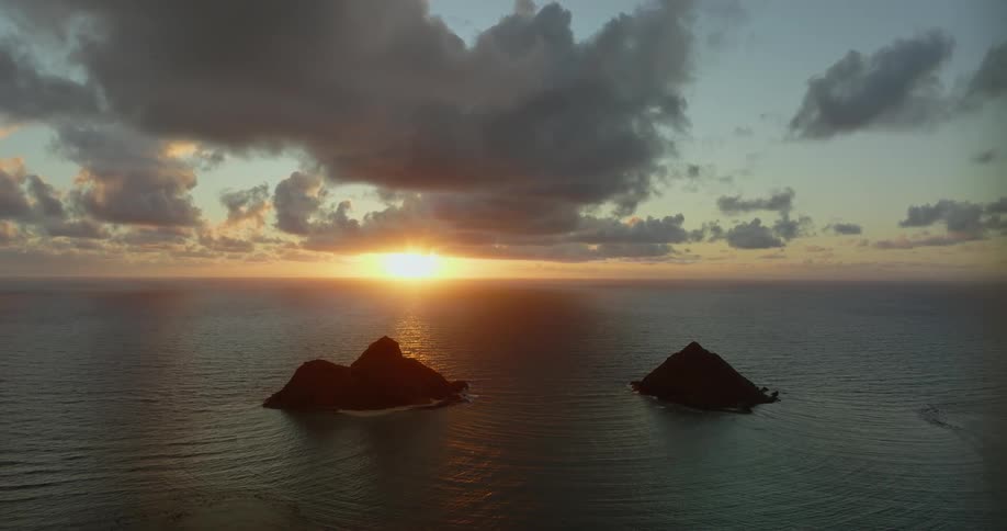 Small islands jut out of the ocean just off the coast