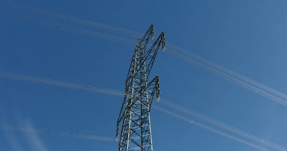 Cables connected to an electrical transmission tower