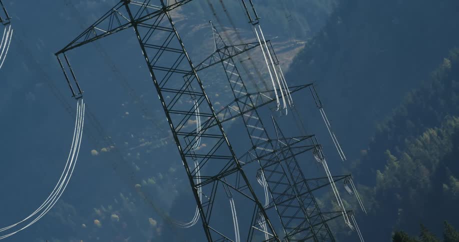 The view is of the outdoors nature area and you can see the power lines