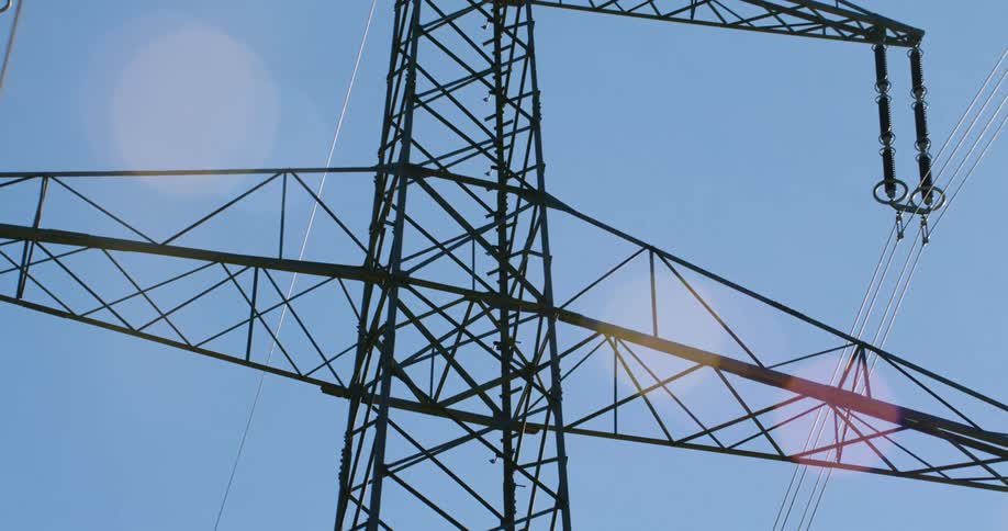 Multiple power lines are connected to a transmission tower