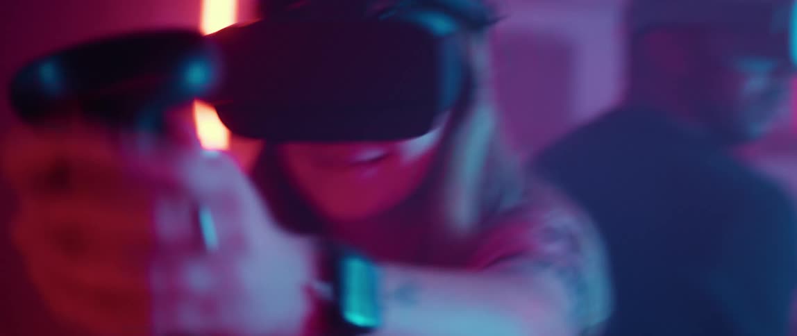 Man and woman game with vr headset and a controller