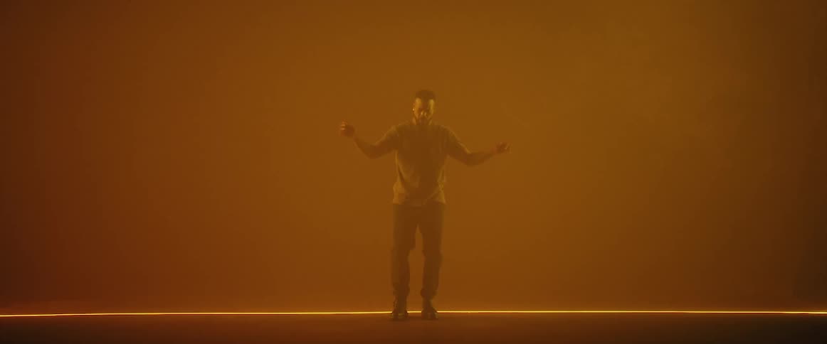 A man dancing on a stage
