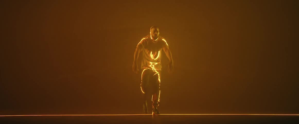 A man passes by a laser