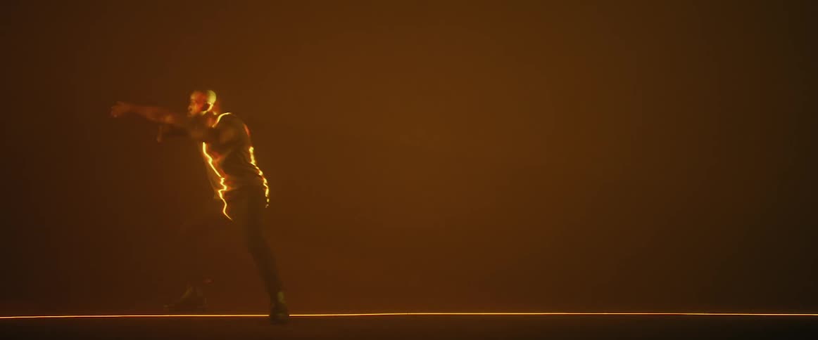 A man dancing on a stage