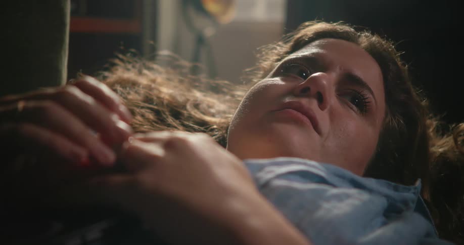 A woman laying in a bed
