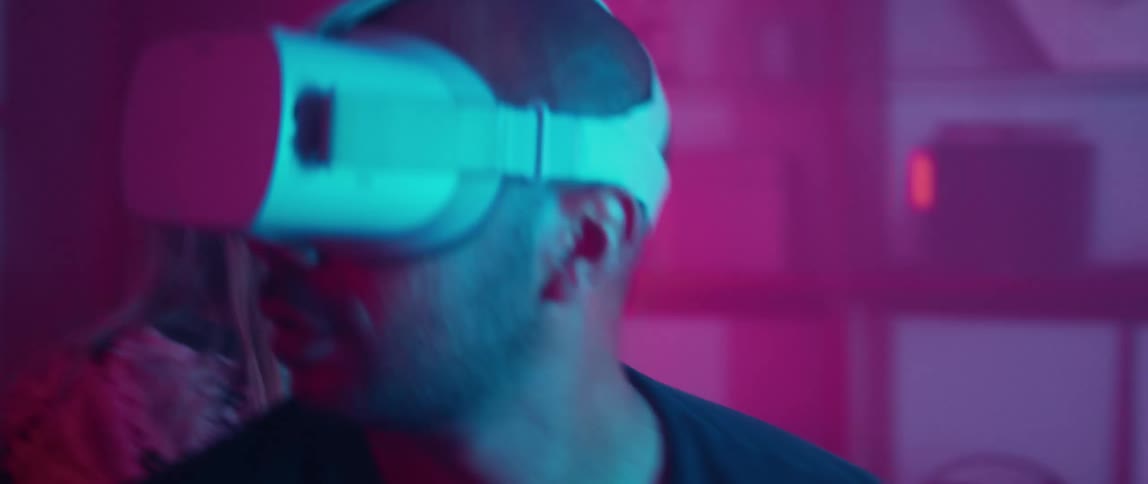 A man and woman are playing a game in virtual reality