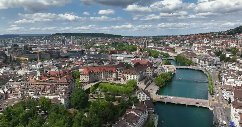 Buildings in a city with a river from an aerial view during the day