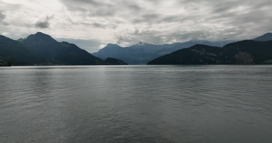 Clouds floating above a mountain lake in nature
