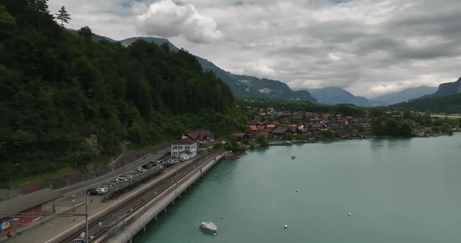 A town is on the waterfront in the mountains