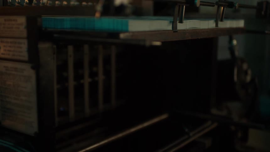 Printing machine picks up a sheet of paper and puts out printed sheet