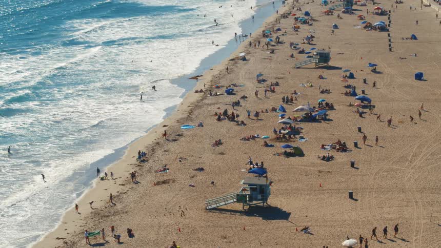 Crowded beach during a sunny summer day
