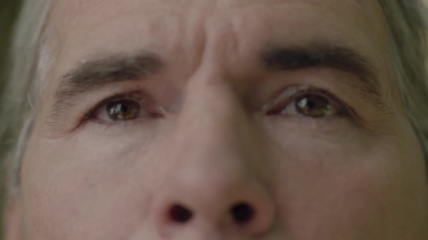 The eyes of an older gentleman as he looks ahead