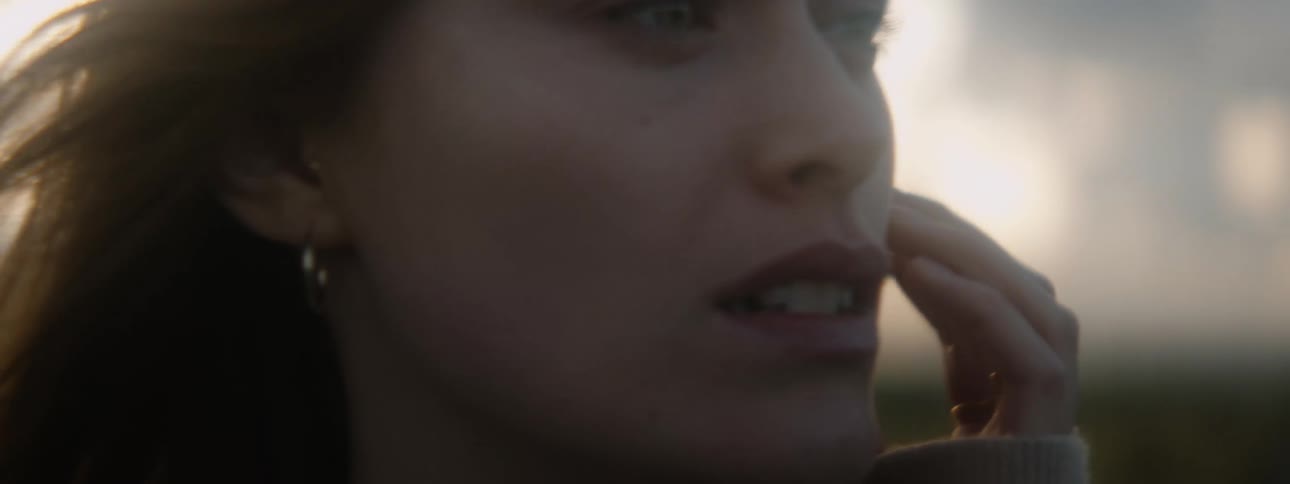 Young redhaired woman looking around with a confused face
