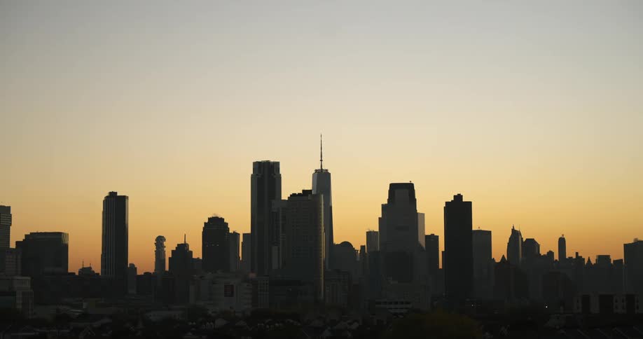 A downtown skyline with high rise office buildings at dusk