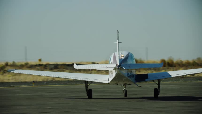Beechcraft Bonanza airplane performing a run up pre flight check before taking flight