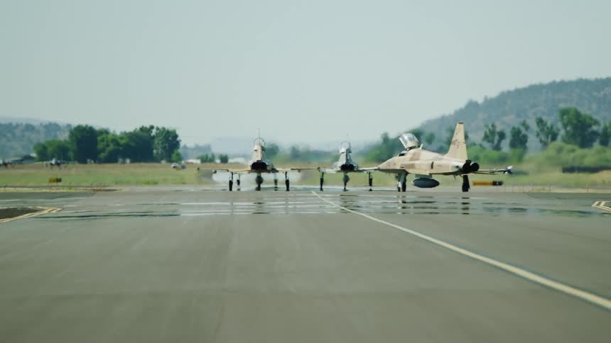 F-15 fighter jets taxi on the jetway before take off to patrol the national airspace