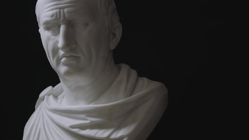 A stone carved bust of a man