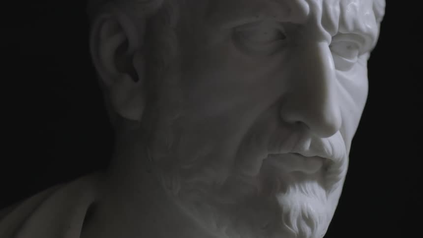 A white, bearded statue