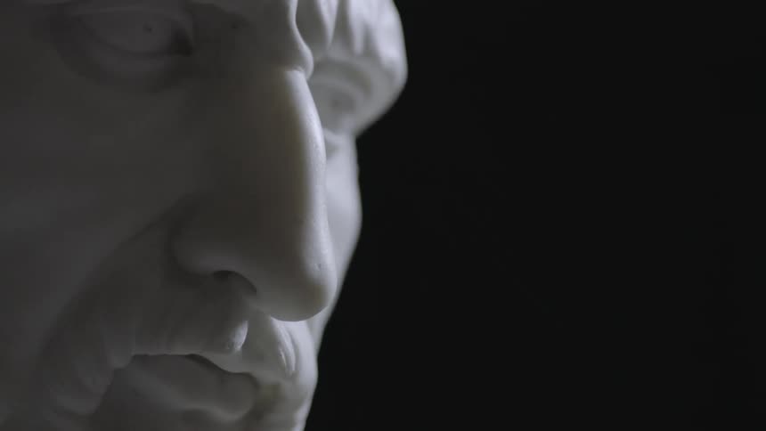 Light shining on the face of a statue