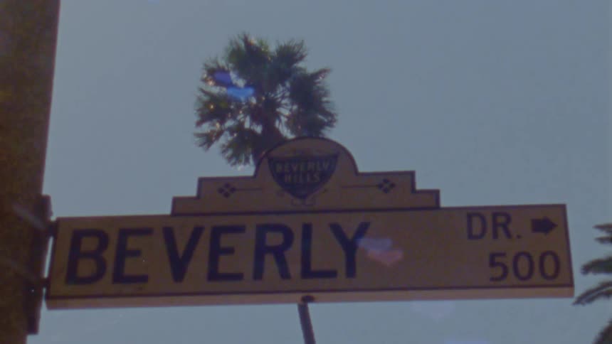 A street sign in a city during the day
