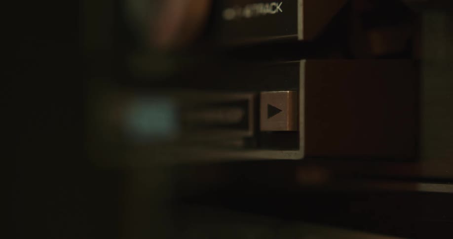 Person pushes the play button on machine