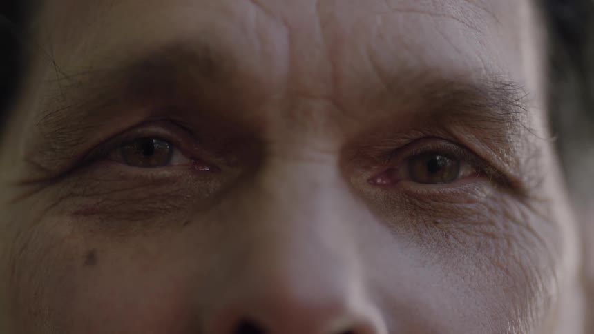 A man stares intently at what is ahead of him