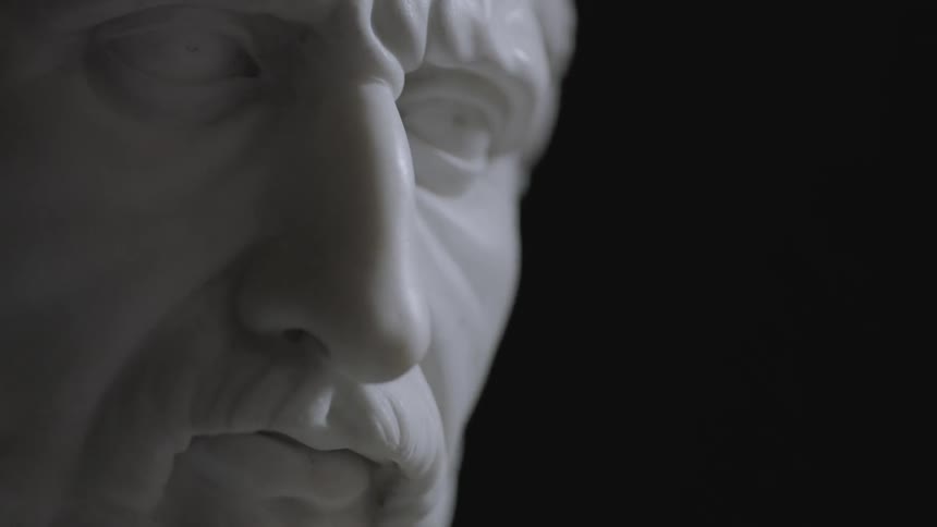 A marble statue of a roman god