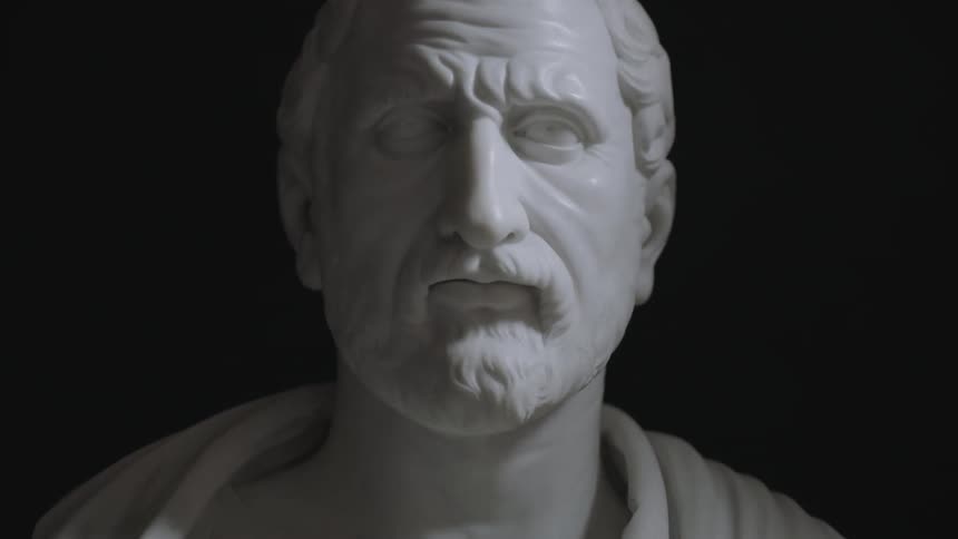 Close-up of a bearded man's statue