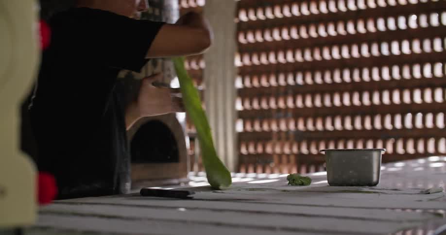 A ma working with things in a room