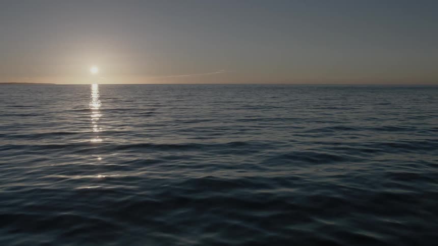 Gentle waves as seen at sunset