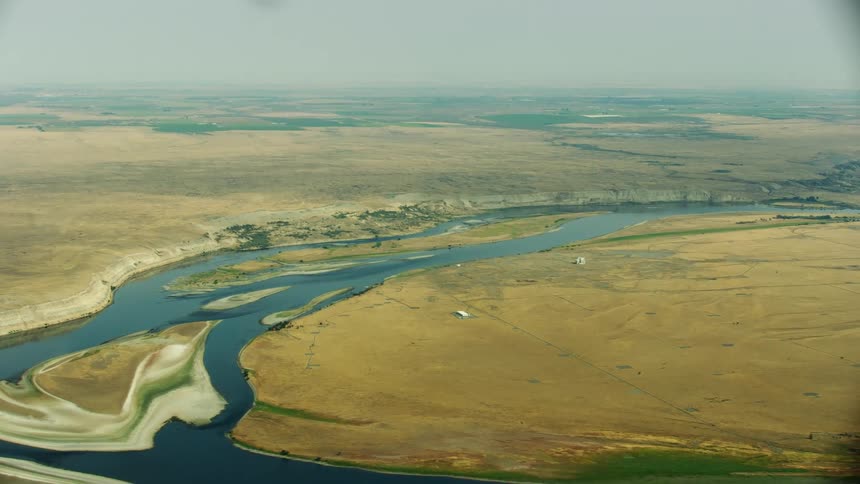 Aerial view of the Columbia River flowing through the Hanford Nuclear Superfund site in Eastern Washington