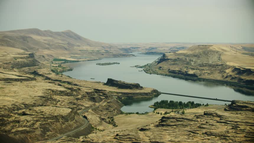 Sun baked Columbia River plateau under the hot August sun in this aerial shot of the Columbia River on a gritty hot summer day