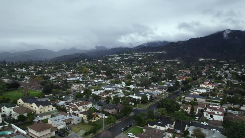 Aerial view of a neighborhood on a small town near the mountains