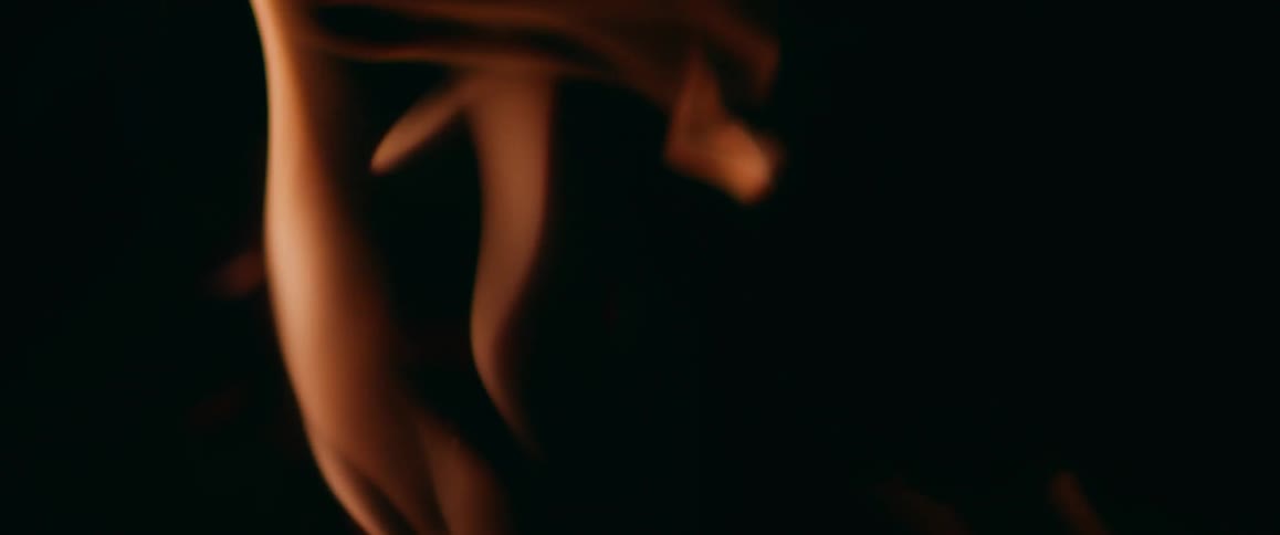 Close up of fire burning on dark background