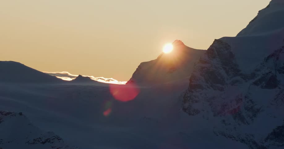 Time lapse view of mountains are displayed during sunset