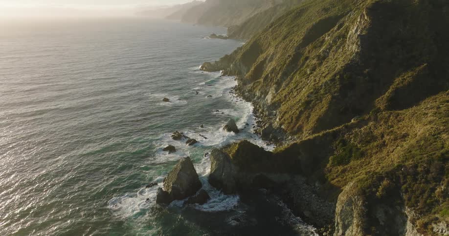The waves crash against the island shores