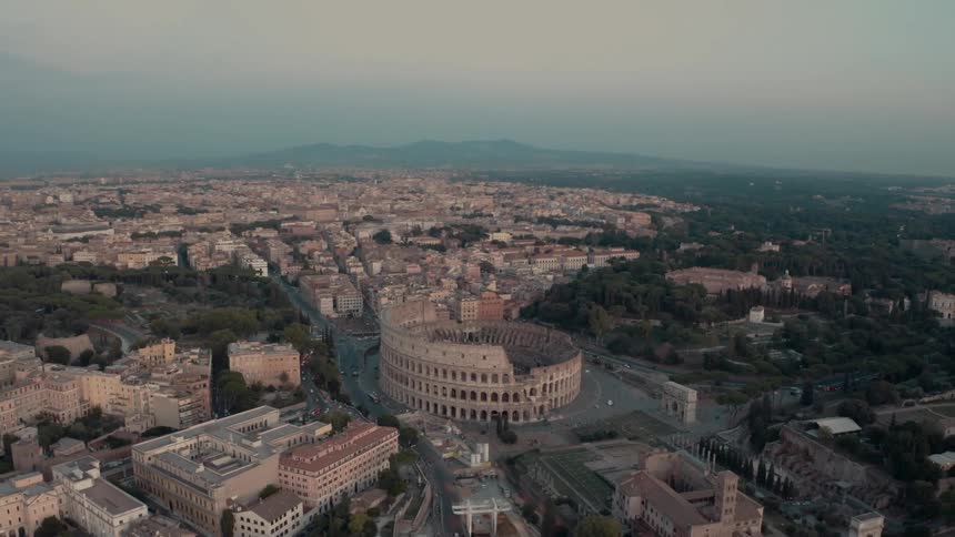 Aerial view of the ruins of the colosseum in rome at evening