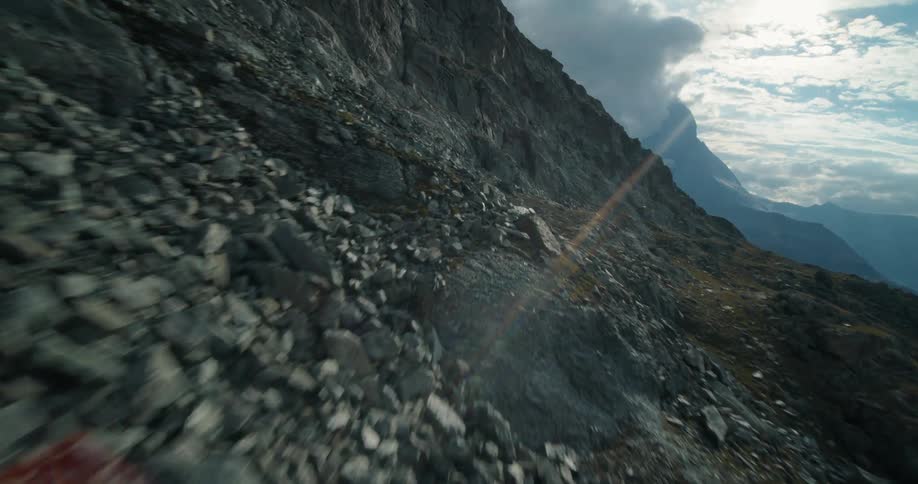 Boulders and small rocks litter the mountain tops