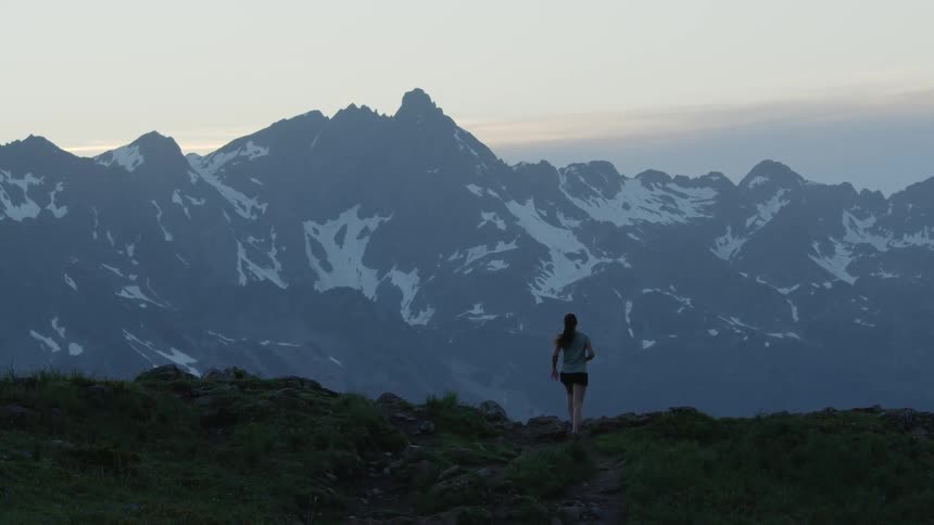 A view of a woman running outdoors