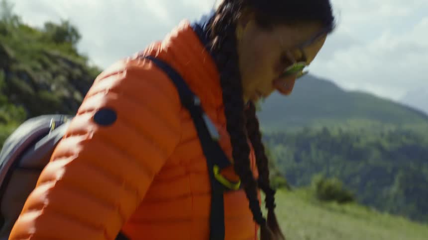 A woman is getting ready to paraglide
