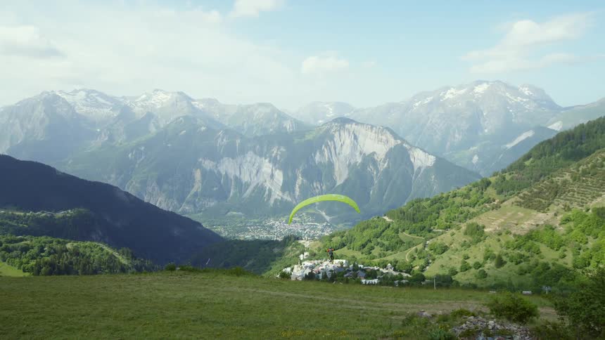 A person paragliding outdoors