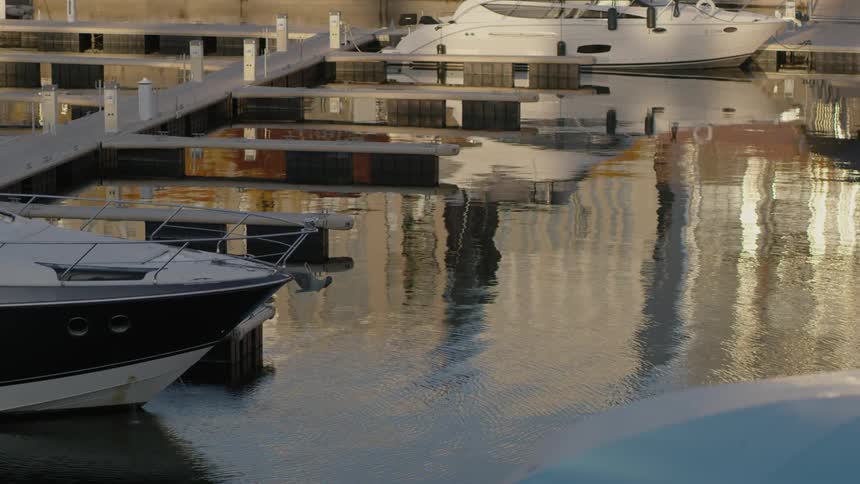 Moored small boats at marina