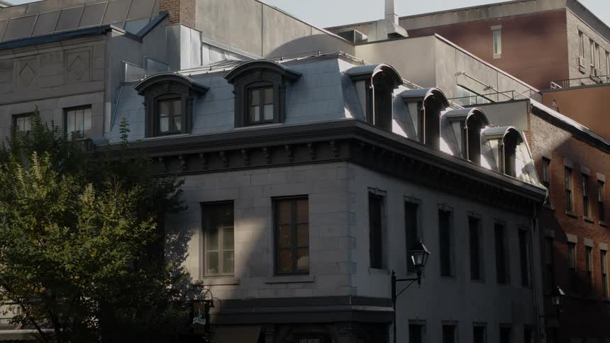 Facade of a small building on a small city block at morning