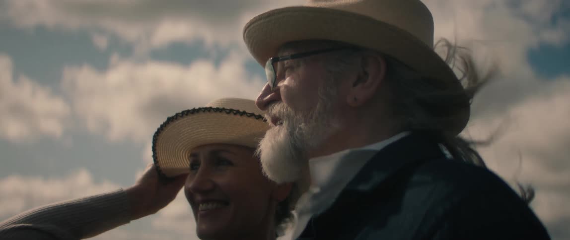 Man and woman are standing outdoors together
