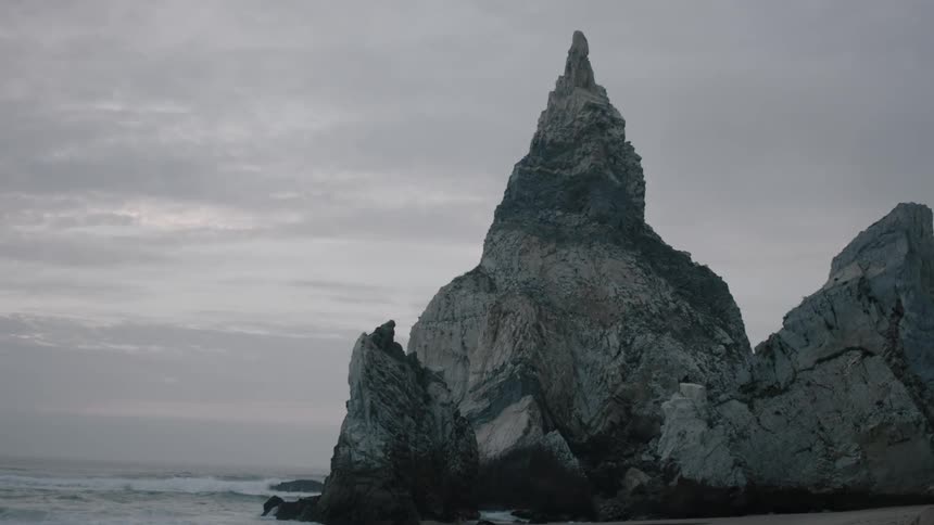 Very tall pointy rocks at a beach
