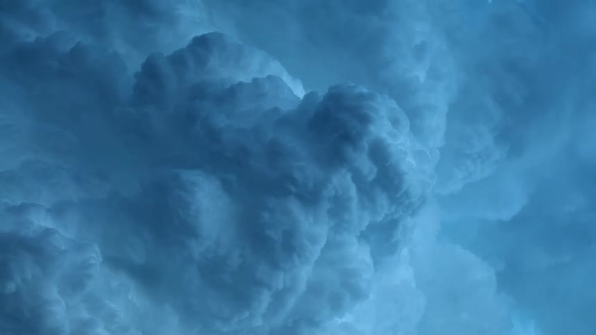 Dark clouds float and gather int the sky