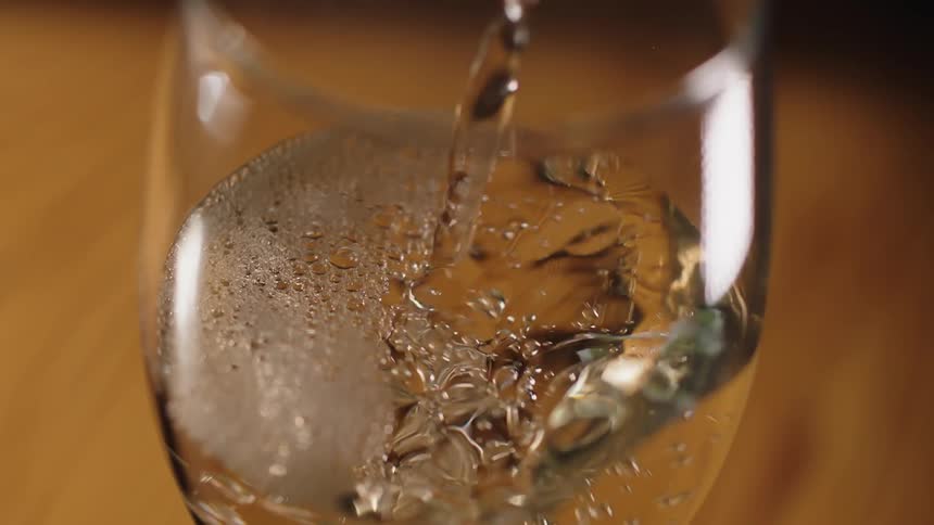 Liquid being poured out into a glass