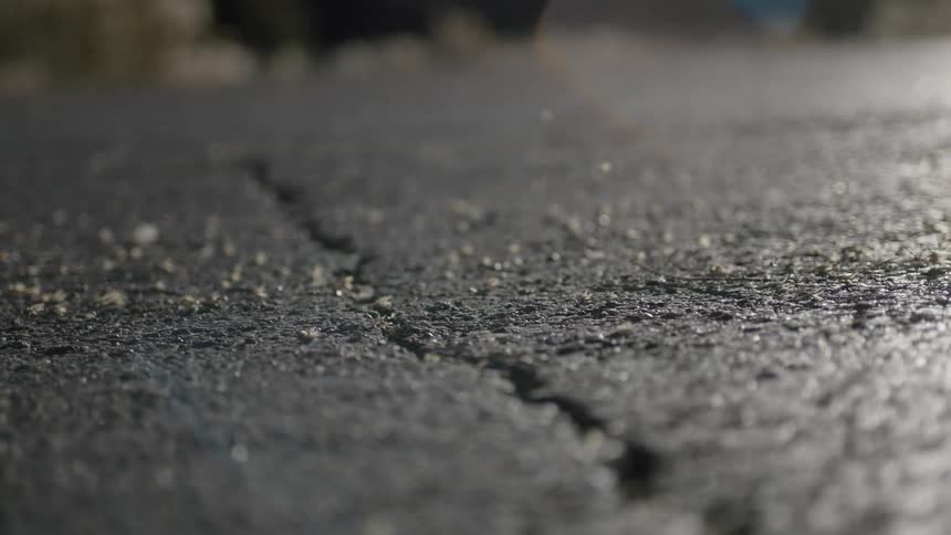Debris on the ground blows in the wind