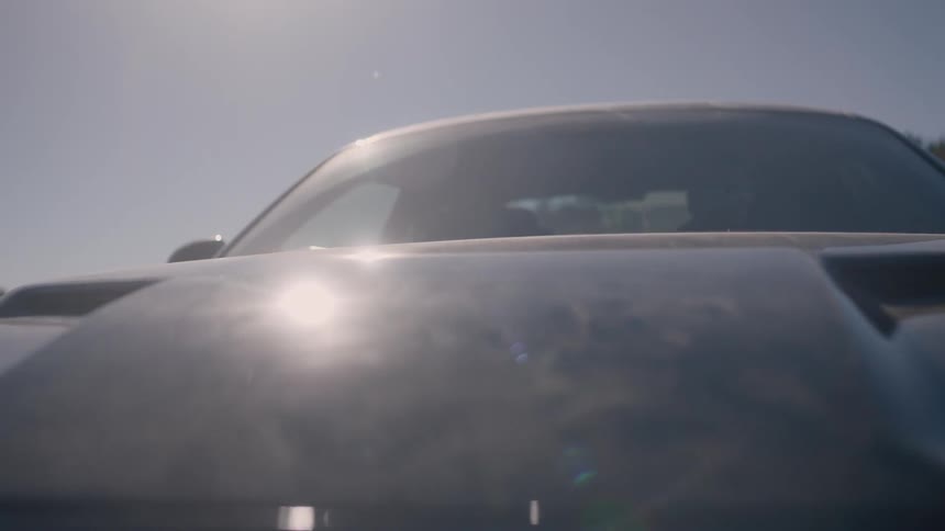 The sun is reflecting off this car hood